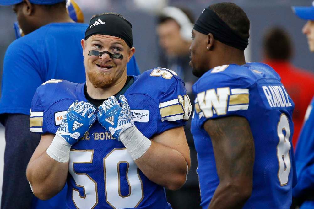 john woods / THE CANADIAN PRESS files
Blue Bombers linebacker Adam Bighill knows how much a Blue and Gold victory in today’s Grey Cup would mean to the club’s faithful and long-suffering fans.