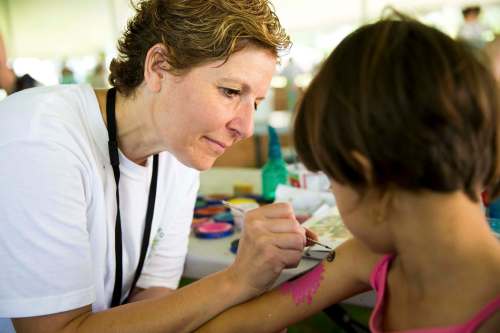 Carla Dorbolo, head of face painting at the family area. (Photos by Mikaela MacKenzie / Winnipeg Free Press)