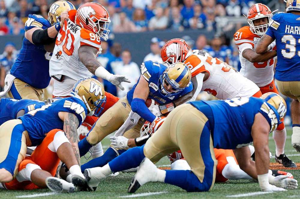 THE CANADIAN PRESS/John Woods
Rookie Bombers quarterback Chris Streveler plaid a part in Winnipeg's win over B.C. Saturday, with five carries for 33 yards, including two short-yardage rushing touchdowns.