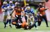 Darryl Dyck / The Canadian Press files
Bombers tailback Andrew Harris runs the ball past B.C. Lions defender Bo Lokombo during CFL play in Vancouver. Harris leads the league in rushing so far this season.