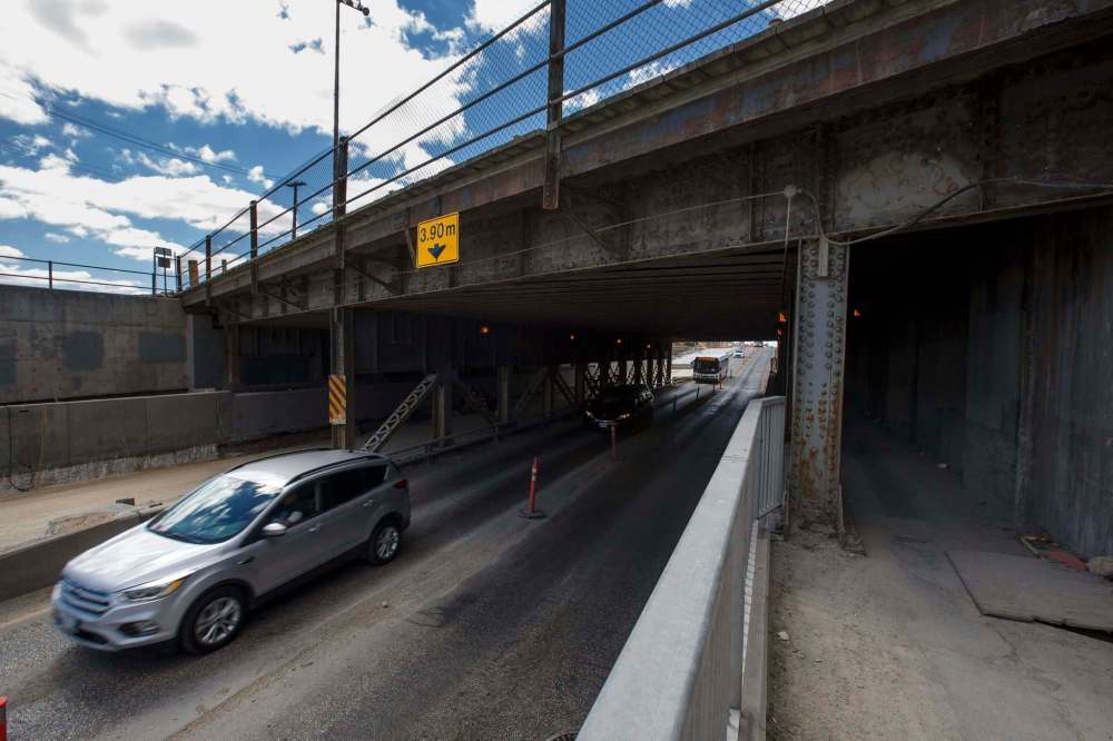 (Mike Deal / Winnipeg Free Press)
The McPhillips underpass is being dug deeper so trucks no longer slam into the rail bridge above.