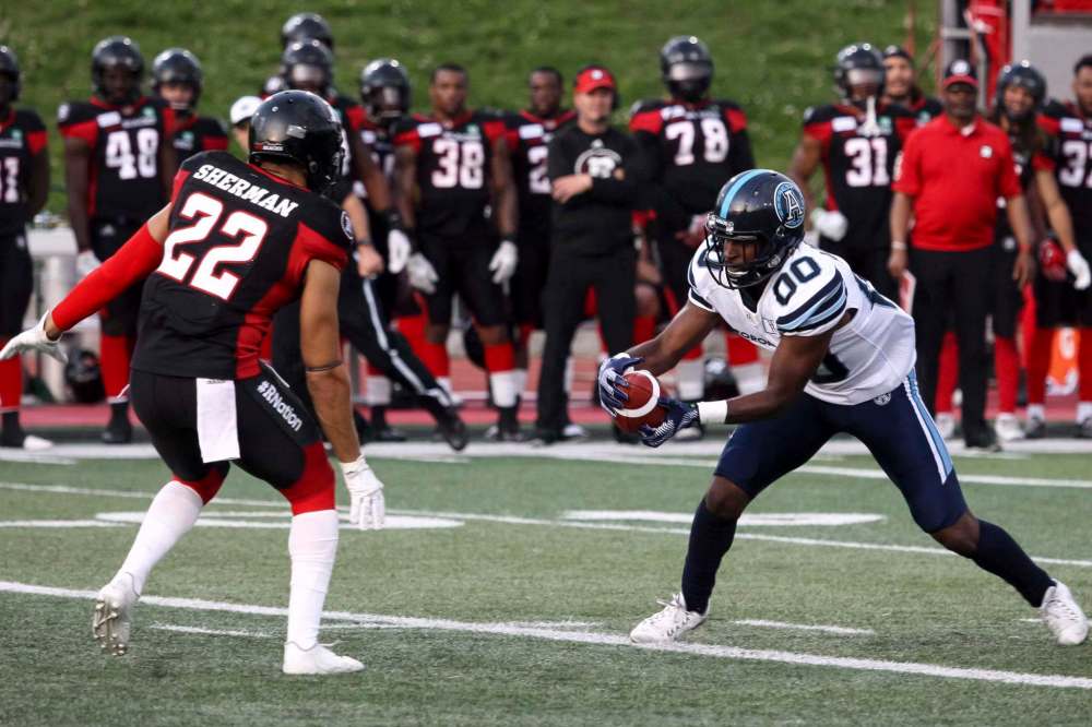Mark Spowart / The Canadian Press files
Teague Sherman (left) has been cut from the Ottawa Redblacks in the aftermath of two sexual-assault charges being laid against him.