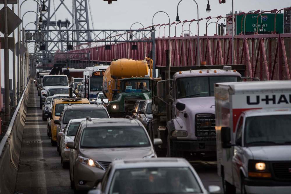 Vehicles sit in traffic while exiting the Williamsburg Bridge in New York, one of nine U.S. cities studied for Bruce Schaller’s report entitled Unsustainable? (Victor J. Blue / Bloomberg files)
