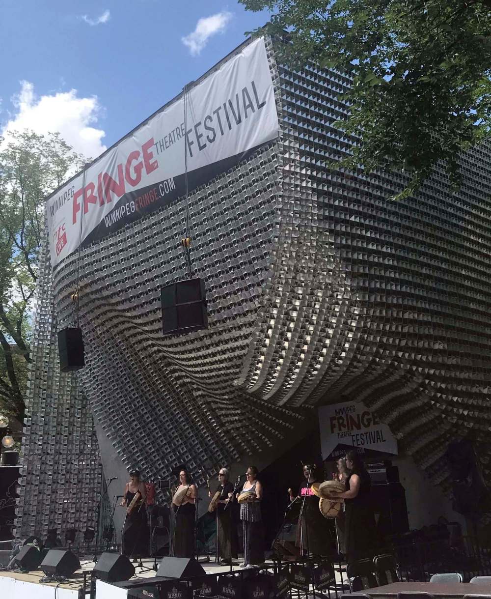 KYLEE SINCLAIR / WINNIPEG FREE PRESS
The Buffalo Gals Drum Group performs at the Fringe festival free mainstage in Old Market Square this week.