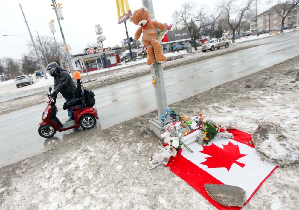 PHIL HOSSACK / WINNIPEG FREE PRESS FILES
A memorial was set up at the corner of St. Anne's Road and Varennes Avenue after Surafiel Musse Tesfamariam, 8, was killed at the crosswalk in February.