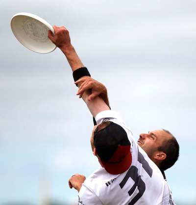 PHIL HOSSACK / WINNIPEG FREE PRESS - Team Torque's #31Aaron Dobson goes high and wins possession against Best Before's #3 Dan Benvenuti in Ultimate Play Wednesday. See Mike Sawatzky's story. - July 31, 2018