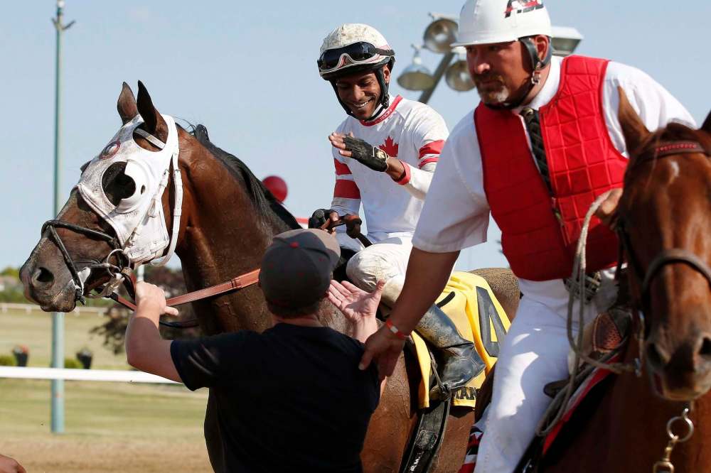 Rocp Walcott riding Sky Promise. (John Woods / Winnipeg Free Press)