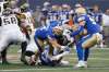 JOHN WOODS / THE CANADIAN PRESS
Bombers linebacker Adam Bighill (centre) forces a fumble from Tiger-Cats running back Alex Green during Friday night’s game at Investors Group Field. Bighill led Winnipeg’s improving defence, finishing with a team-high seven tackles.