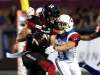 Ottawa Redblacks' Jean-Christophe Beaulieu (46) tries to keep the ball away from Montreal Alouettes' Chip Cox (11) during first half CFL action in Ottawa on Saturday, Aug. 11, 2018. THE CANADIAN PRESS/Justin Tang