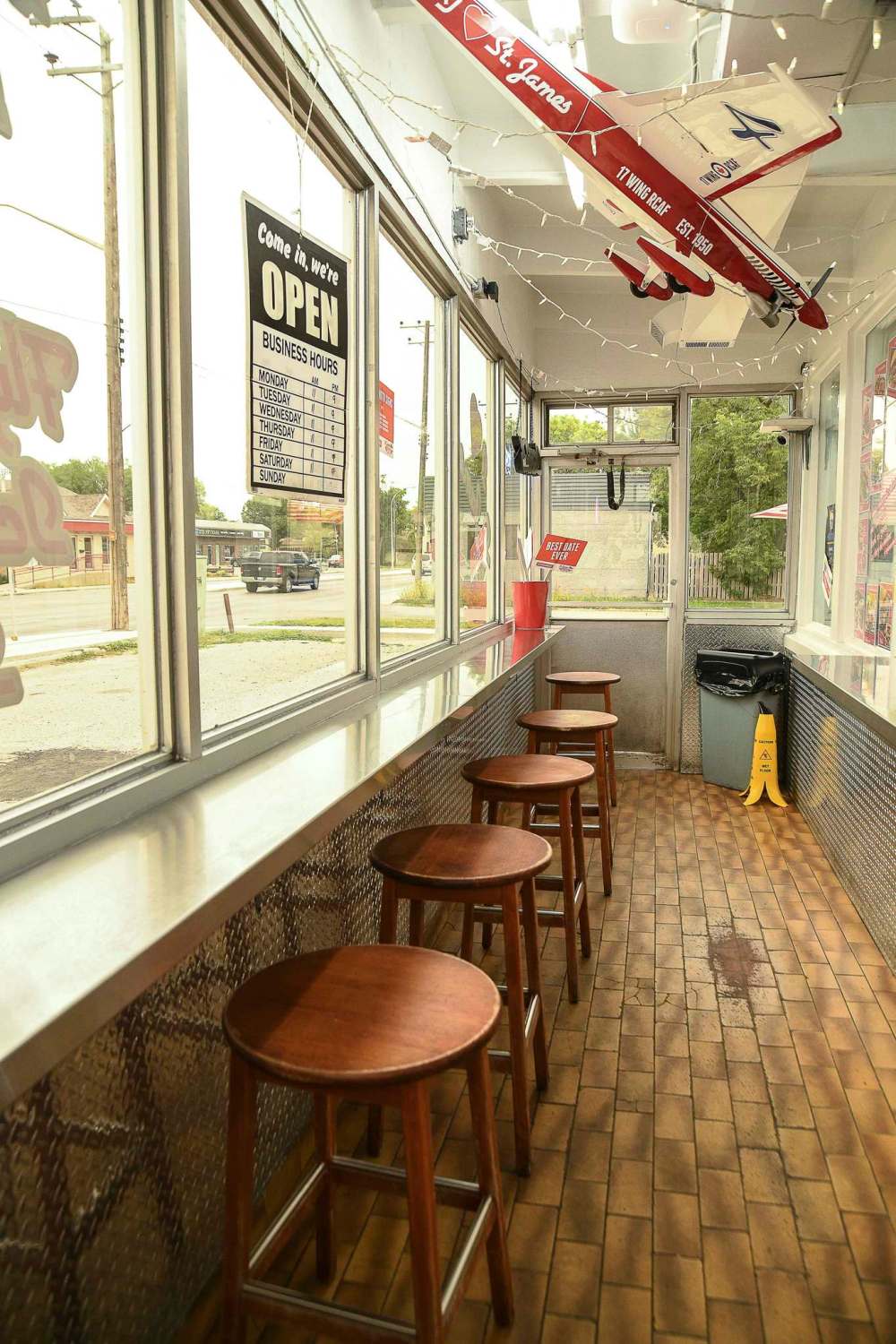 The interior of St. James Burger & Chip Co. pays tribute to its Red Boot Drive Inn roots and proximity to the Air Force Heritage Museum. (Free Press files)