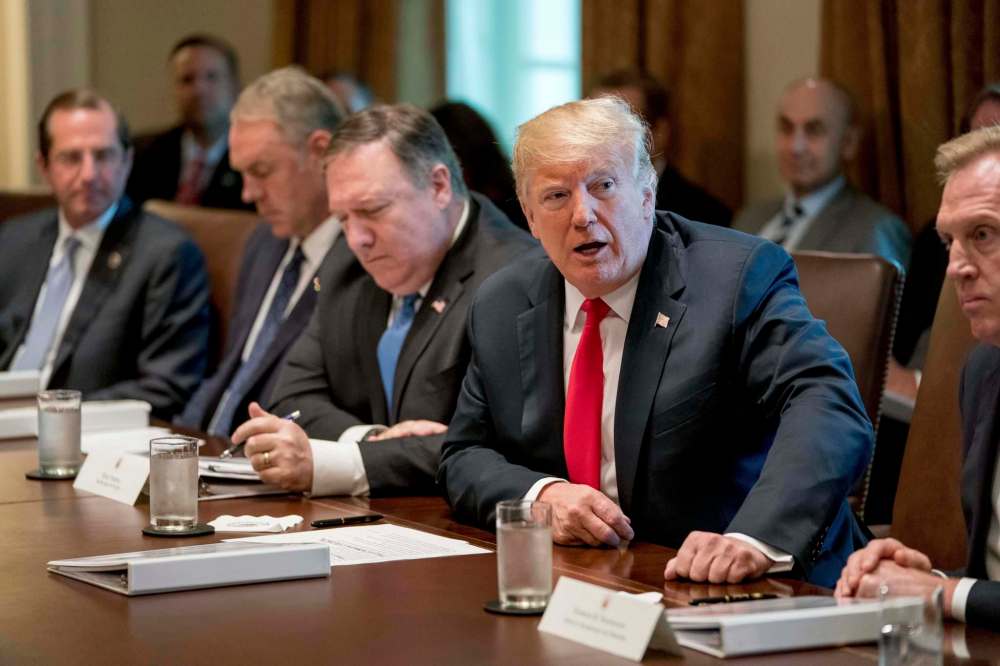 Author Chris Hedges says U.S. President Donald Trump is not the cause of the disintegration of the U.S., he is the result of it. (Andrew Harnik / Associated Press files)