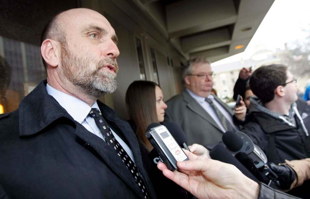 TREVOR HAGAN / THE CANADIAN PRESS
Mark Stobbe’s lawyer, Tim Killeen, addresses media outside Law Courts in Winnipeg, Thursday, March 29, 2012. A jury has found Stobbe not guilty of second-degree murder in the hatchet death of his wife.