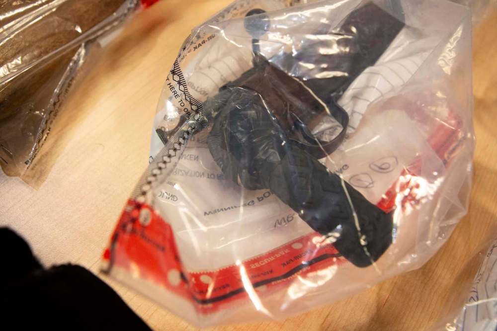 A bicycle handle attached to the butt of a rifle. (Andrew Ryan / Winnipeg Free Press)