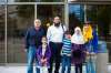The family of Shaffaq Asif (left), Tamiyah Mubeen, Azhar Mubeen, Buraq Mubeen, Hafsah Mubeen and Khudija Mubeen are fighting the city over a $27,000 water bill. (Mikaela MacKenzie / Winnipeg Free Press files)