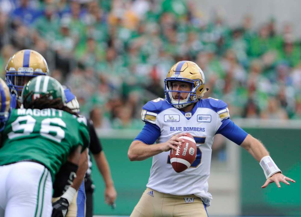 MARK TAYLOR / THE CANADIAN PRESS
Winnipeg Blue Bombers quarterback Matt Nichols runs against the Saskatchewan Roughriders during first half CFL football action at Mosaic Stadium in Regina on Sunday, Sept. 2, 2018.