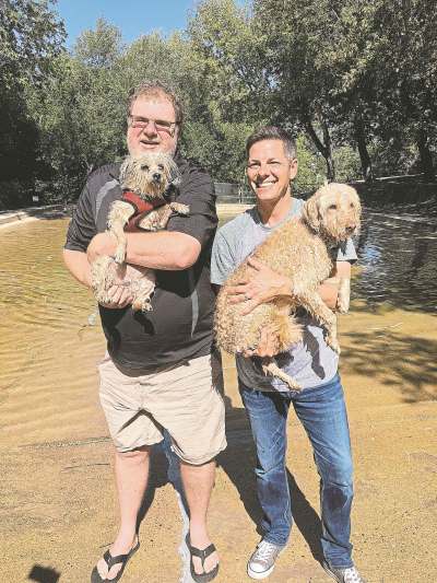 KAYLEIGH SPEIRS PHOTO
Doug Speirs (left) holds Juno along with Winnipeg Mayor Brian Bowman and his dog, Indiana.