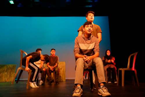 Supplied
Mustapha Aljaber (centre top) and Mohammad Noor Aljaber in rehearsals for A Ten Star Family.