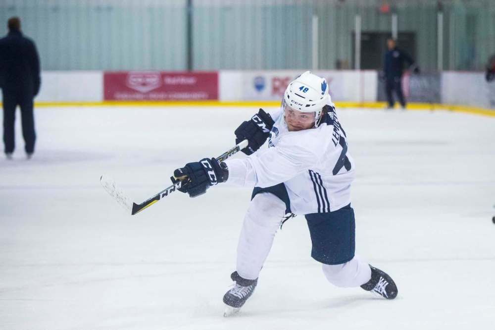 MIKAELA MACKENZIE / WINNIPEG FREE PRESS
Jets prospect forward Brendan Lemieux blasts a shot at practice Friday at the Bell MTS Iceplex. Lemieux, who played with the Manitoba Moose last season, aims to make the Jets this year.