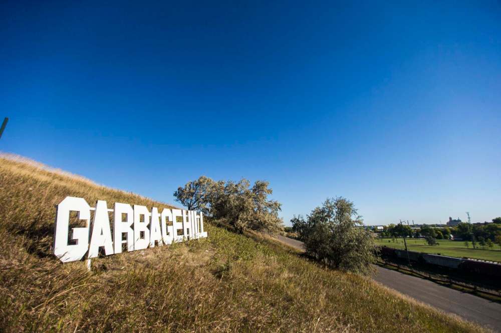 A Hollywood-esque sign on Garbage Hill was taken down by the city Monday hours after it appeared. (Mikaela Mackenzie / Winnipeg Free Press)