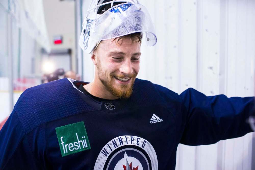 MIKAELA MACKENZIE / WINNIPEG FREE PRESS
Jets goalie Laurent Brossoit speaks to the media at Bell MTS Iceplex on Wednesday.
