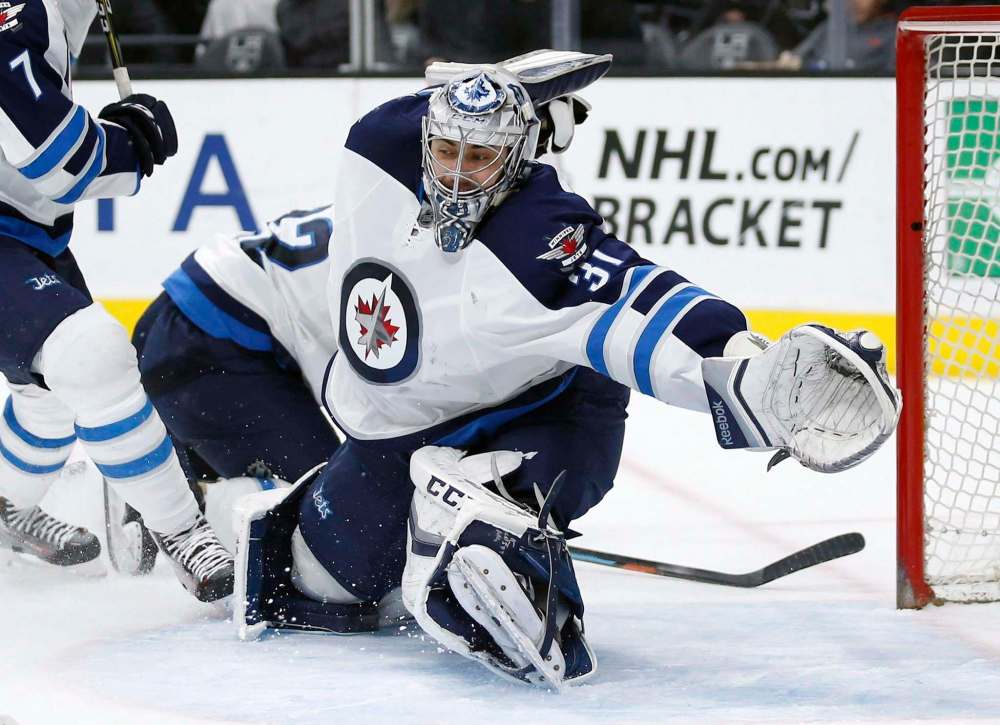 THE CANADIAN PRESS/AP/Danny Moloshok, File
Former Winnipeg Jets goalie Ondrej Pavelec announced his retirement Thursday.