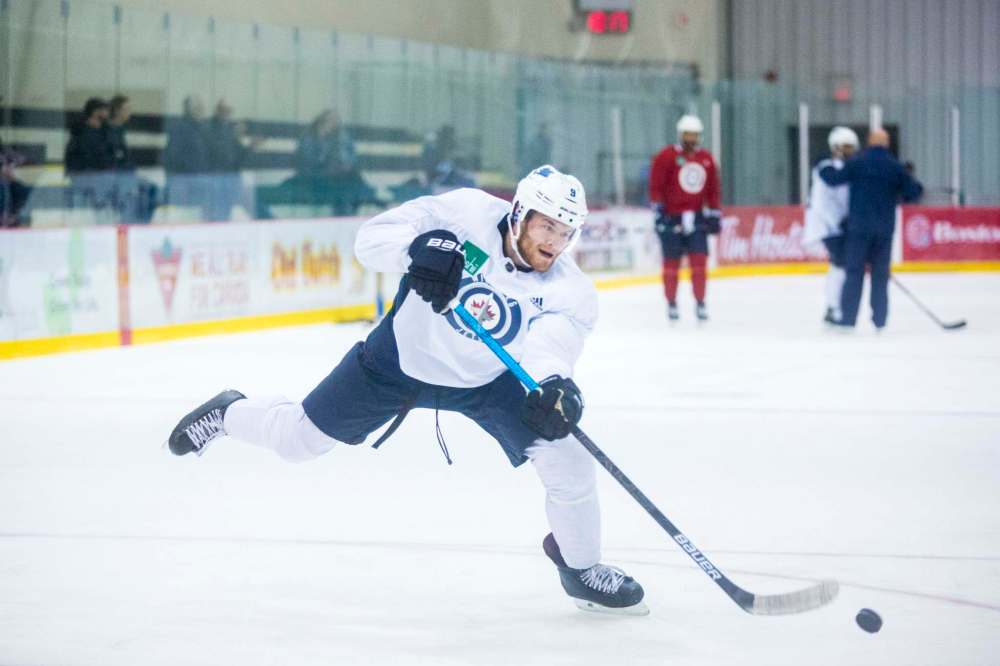 Andrew Copp will begin this year on a line with Adam Lowry and Brandon Tanev, making life miserable for the other team's best players. (Mikaela MacKenzie / Winnipeg Free Press)