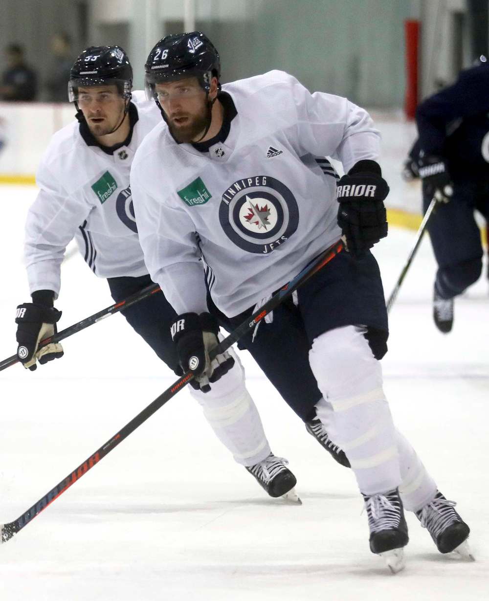 TREVOR HAGAN / WINNIPEG FREE PRESS FILES
Mark Scheifele (left) and Blake Wheeler will once again be two of the Winnipeg Jets' biggest contributors this season.