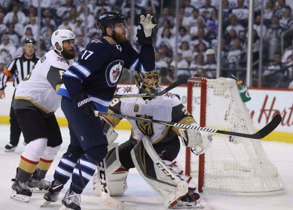 Adam Lowry only played 45 regular-season games for the Jets last year because of injuries. (Trevor Hagan / The Canadian Press files)