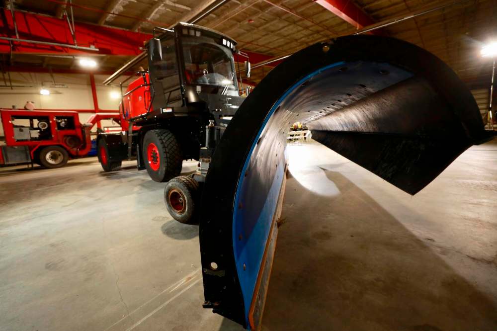 Winnipeg's airport will soon be the first in North America to have a robot plowing paths for planes. (Ruth Bonneville / Winnipeg Free Press)