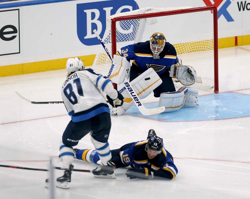 Scott Kane / The Associated Press Files
Winnipeg Jets left winger Kyle Connor (left) recorded a goal and an assist in the team’s opening game against the St. Louis Blues on Thursday.