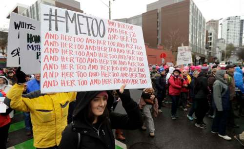 TED S. WARREN / THE ASSOCIATED PRESS FILES
A marcher carries a sign with the popular Twitter hashtag #MeToo used by people speaking out against sexual harassment as she takes part in a Women&rsquo;s March in Seattle, Saturday, Jan. 20, 2018. On the anniversary of President Donald Trump&rsquo;s inauguration, people participating in rallies and marches in the U.S. and around the world Saturday denounced his views on immigration, abortion, LGBT rights, women&rsquo;s rights and more.