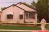 Police investigate the slayings of Russell Krowetz, Stefan Zurstegge and James Gross at 319 Semple Ave. (Winnipeg Free Press files)