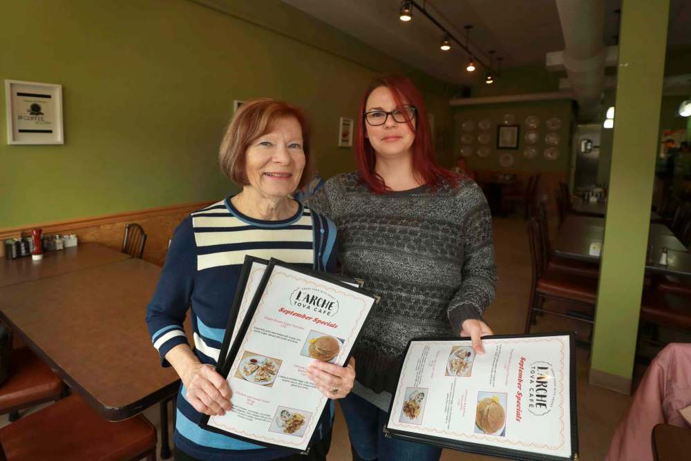 L’Arche Tova Café director of fund development Diane Truderung (left) and restaurant supervisor Carley Molnar.