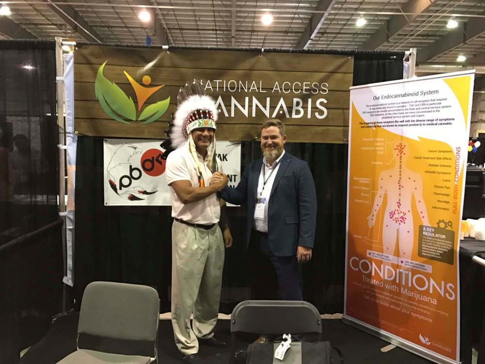 SUPPLIED
OCN Chief Christian Sinclair poses with Chuck Rifici, chairman of National Access Cannabis, last year.