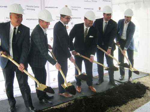 PHOTOS BY Myron Love / Winnipeg Free Press
Seen at the Oct. 2 ceremony are St. Norbert MLA Jon Reyes (from left), Mayor Brian Bowman, Porsche Centre Winnipeg general manager Braeden Mueller, Knight Automotive Group president and Porsche Centre Winnipeg dealer principal Kevin Knight, Porsche Cars Canada president and CEO Marc Ouayoun, and Porsche Cars Canada director of network development Scott Winhold.