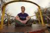 St. James council candidate Kurt Morton, sitting at a playground at Marjorie Park on Marjorie Street, says recreation infrastructure hasn't been a city priority for years. 
 RUTH BONNEVILLE / WINNIPEG FREE PRESS
