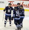 Patrik Laine's promotion to the top line with Mark Scheifele (55) and Blake Wheeler (26), will mean Kyle Connor (81) moves onto the second unit. (Trevor Hagan / Free Press files)