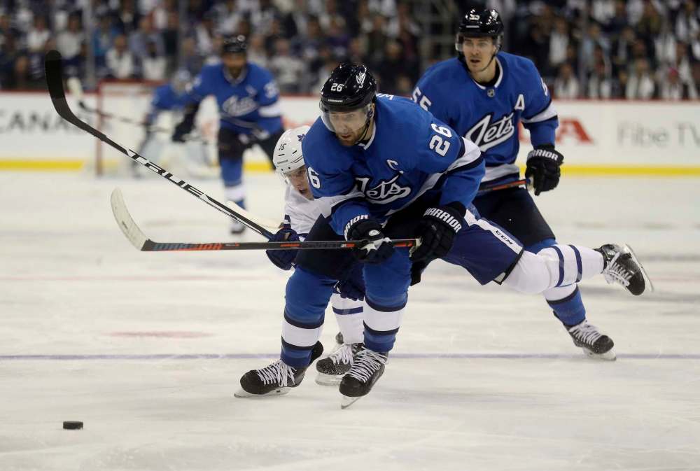 Captain Blake Wheeler has been racking up points, but has already taken a team-leading 17 penalty minutes. (Trevor Hagan / The Canadian Press)