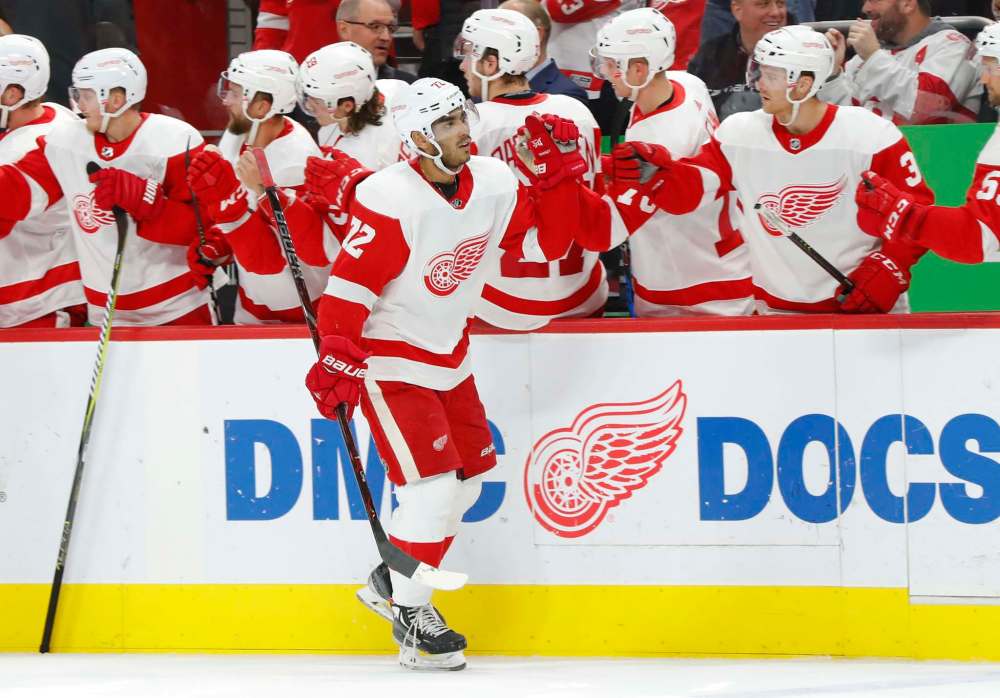 Detroit Red Wings center Andreas Athanasiou (72) celebrates his goal against the Carolina Hurricanes in the third period of an NHL hockey game Monday, Oct. 22, 2018, in Detroit. (AP Photo/Paul Sancya)