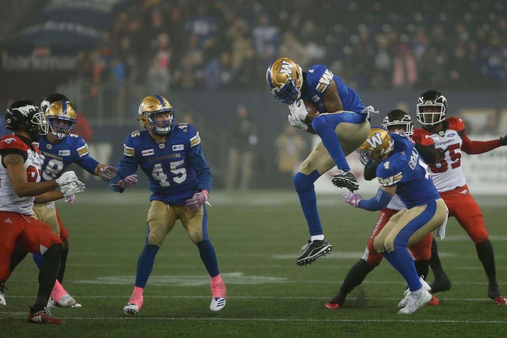 John Woods / The Canadian Press files
Blue Bombers receiver Darvin Adams, seen here grabbing an on-side kick, was one of seven Winnipeg players named to the West Division all-star team.