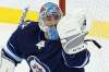 Connor Hellebuyck has posted a 4-4-1 record, a 3.00 goals-against average and .907 save percentage so far this season. (John Woods / The Canadian Press files)