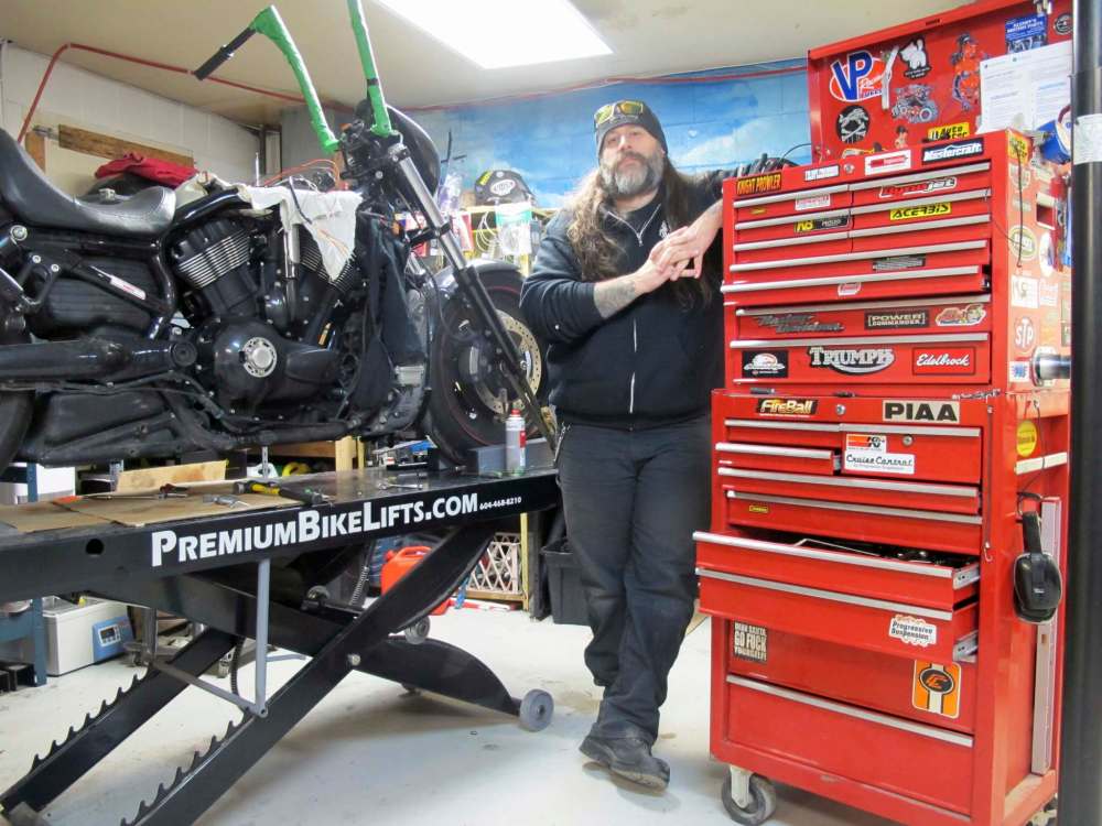 Photos by Willy Williamson / Winnipeg Free Press
Darcy Epp owns Prairie Iron Motorworks, one of the few remaining independent motorcycle shops in the city. Although his passion for bikes was ignited by old British models, he mainly works on Harley-Davidson and metric cruiser bikes now.