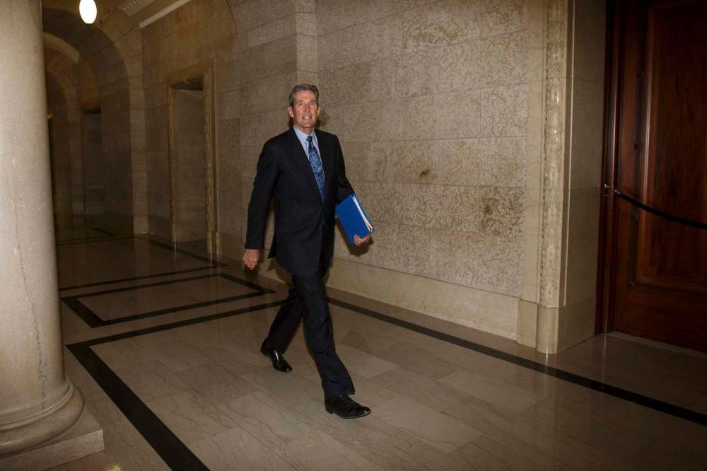 MIKE DEAL / WINNIPEG FREE PRESSManitoba Premier Brian Pallister heads to questions period Wednesday afternoon.181031 - Wednesday, October 31, 2018.