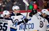 Patrik Laine celebrates a goal with Mark Scheifele (55) and Blake Wheeler in Helsinki, Finland last week. (Martti Kainulainen / Lehtikuva files)