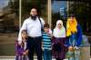 The Mubeen family &mdash; Tamiyah (from left), Azhar, Buraq, Hafsah and Khudija Mubeen &mdash; in front of the Law Courts in August during their fight against the city after being forced to pay a $27,000 water bill on house they purchased. (Mikaela MacKenzie / Winnipeg Free Press files)