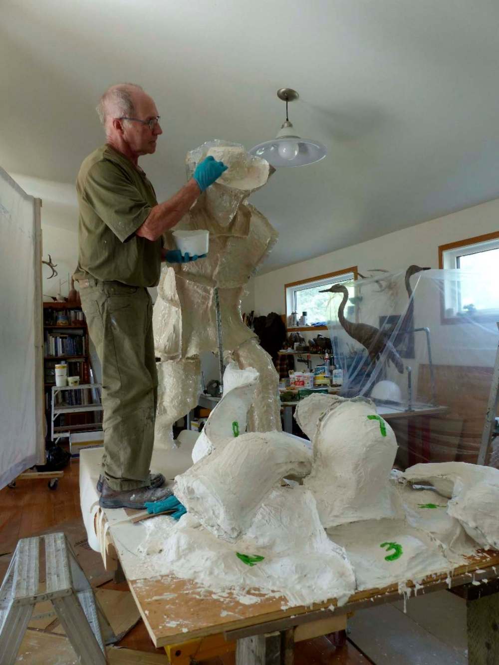 SUPPLIED
Peter Sawatzky working on the sculpture in his studio outside Glenboro.