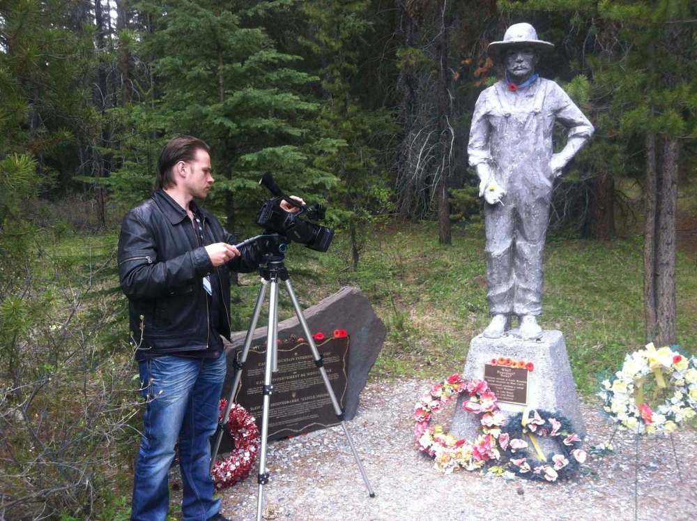 ARMISTICE FILMS
Ryan Boyko films at a monument for Ukrainian internees in Banff National Park in Alberta.