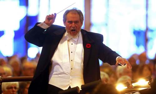 PHOTOS BY TREVOR HAGAN / WINNIPEG FREE PRESS
Conductor Yuri Klaz leads the Winnipeg Philharmonic Choir with the Winnipeg Symphony Orchestra during a concert at the St. Boniface Cathedral&rsquo;s special 100 Years of Remembrance ceremony on Sunday.