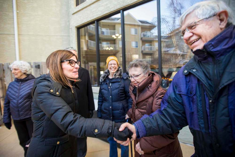 MIKAELA MACKENZIE / WINNIPEG FREE PRESS
Seniors Minister Filomena Tassi (from left) meets with Dorothy Tallman, Gail Cloutier and Bob Galston in Winnipeg on Monday.