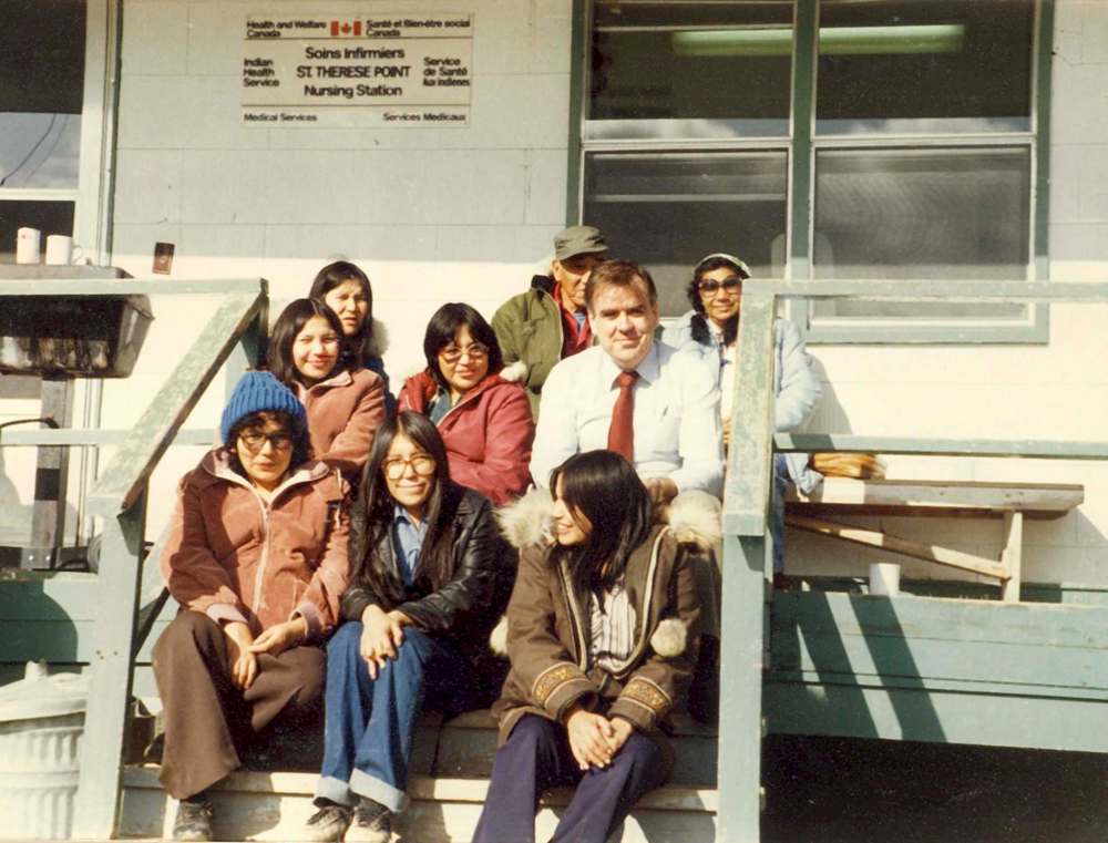 SUPPLIED
Dr. Gerard McCarthy sits with patients at a northern nursing station.